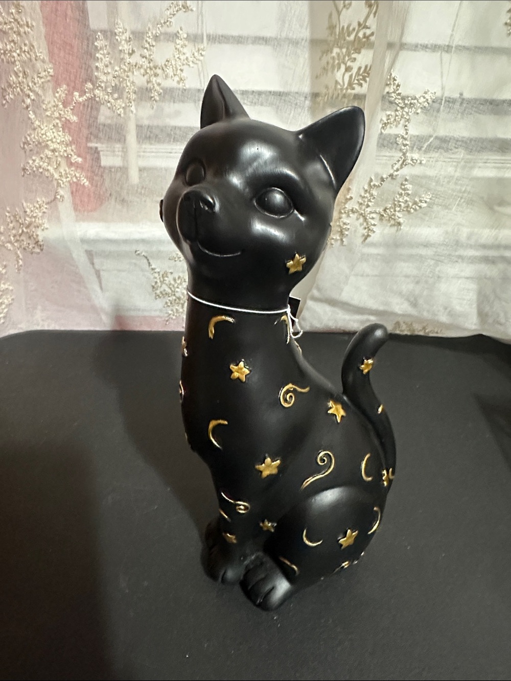 Rachel Zoe black cat with gold accent designs